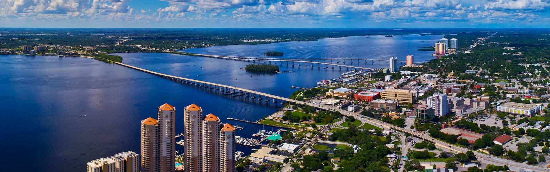 Neon color image of a band playing and people singing along