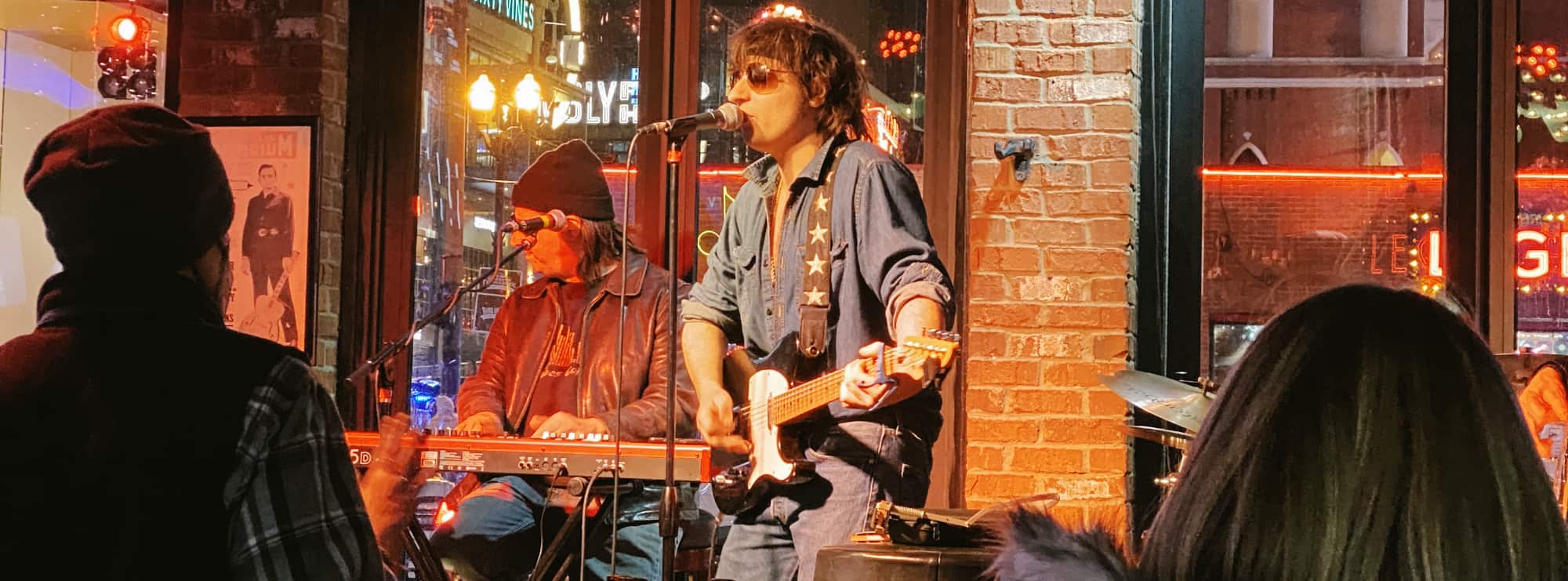 bar singer on guitar in Fort Myers